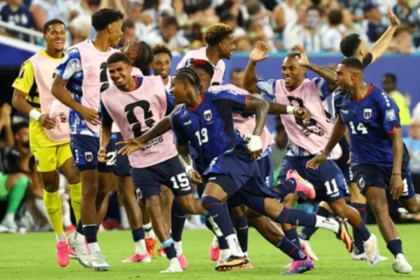 Sidny Lopes Cabral celebrates with teammates after scoring an impossible equaliser to make it 2–2 AET against Argentina.
